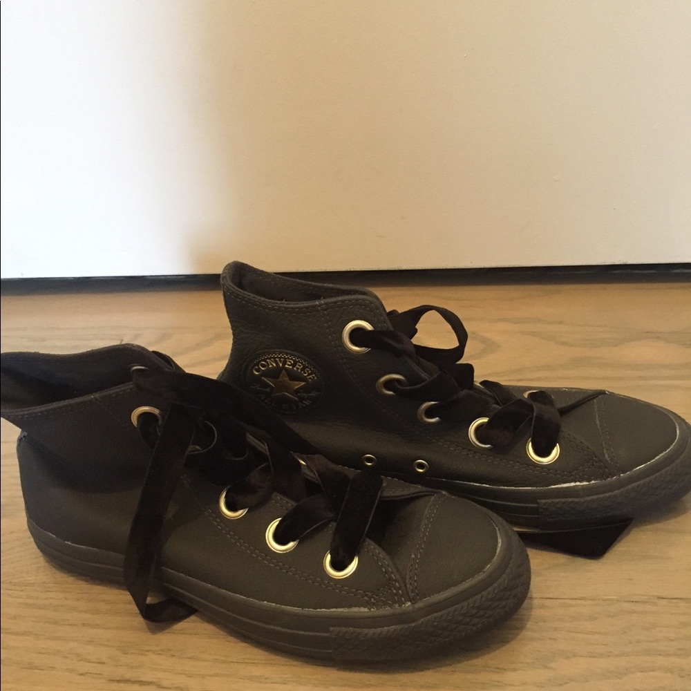 Gray leather converse